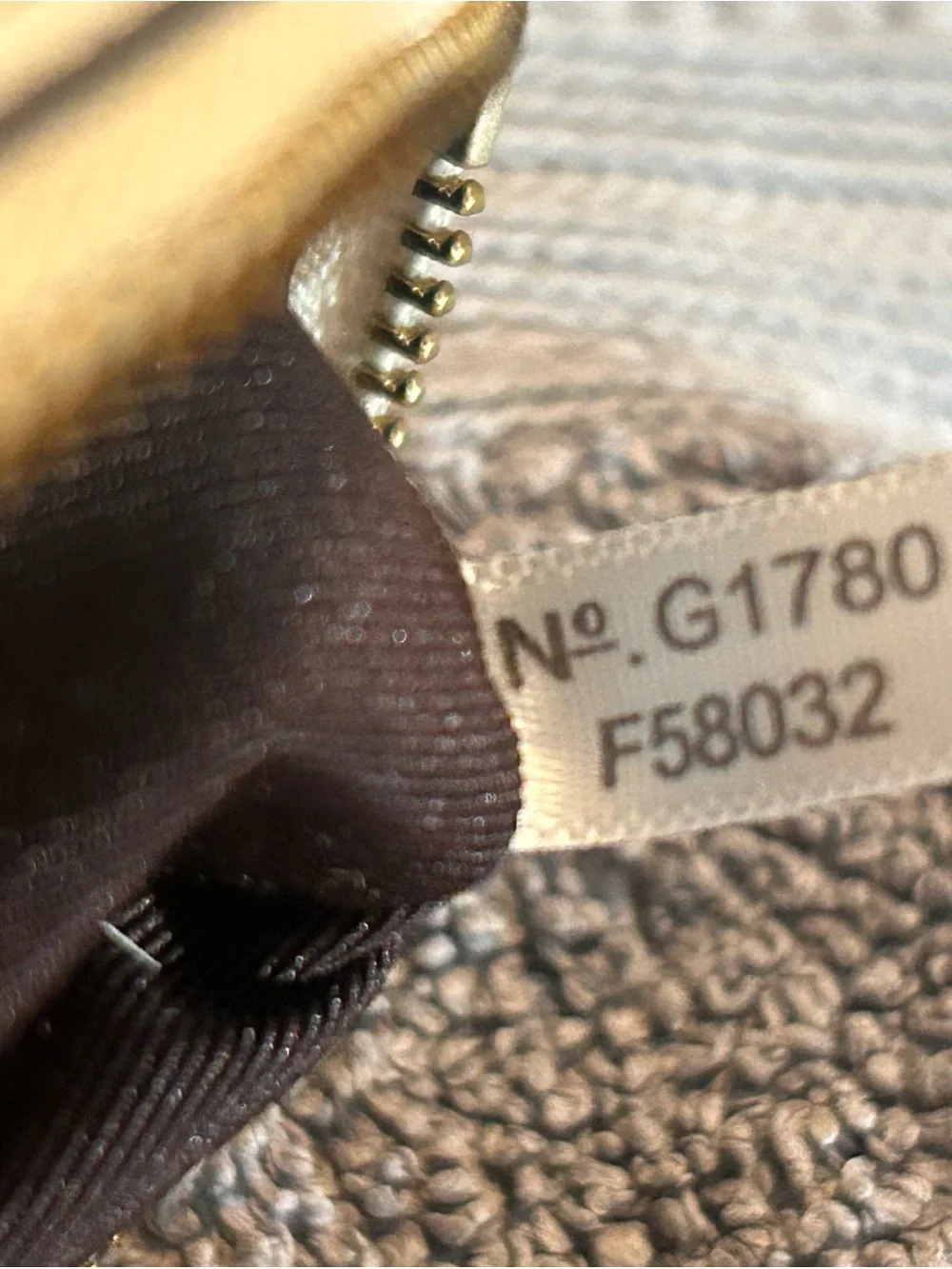 Coach Ivory Leather Wristlet with Gold Logo Accent
